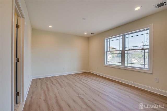 90 Hancock Rd, Piscataway, NJ 08854 - unfurnished room with wood finished floors and recessed lighting