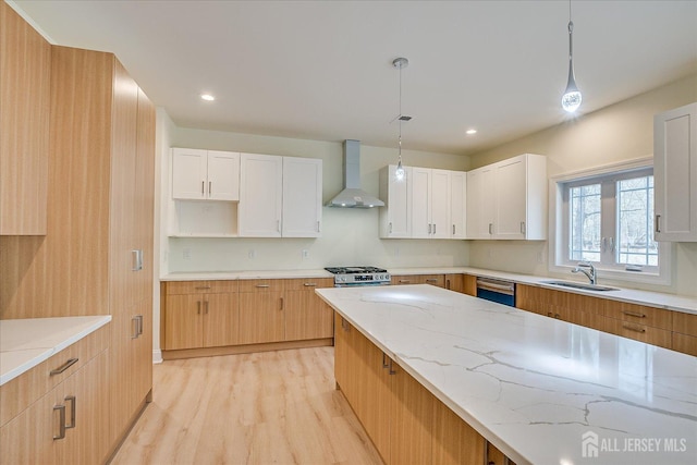 90 Hancock Rd, Piscataway, NJ 08854 - kitchen with wall chimney exhaust hood, light wood-style floors, light stone countertops, stainless steel appliances, and hanging light fixtures