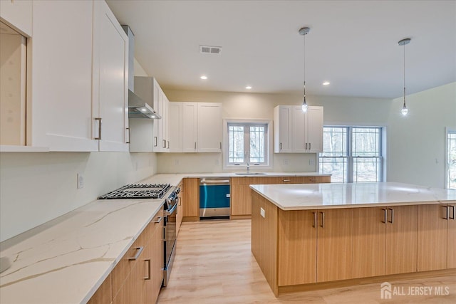 90 Hancock Rd, Piscataway, NJ 08854 - kitchen featuring range with gas cooktop, dishwasher, light wood finished floors, light stone counters, and recessed lighting