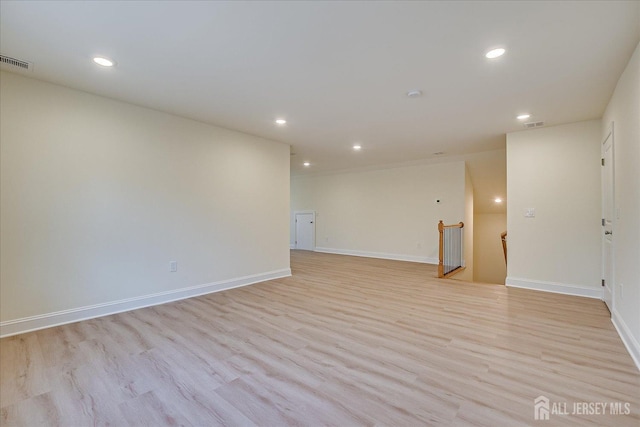 90 Hancock Rd, Piscataway, NJ 08854 - unfurnished room featuring recessed lighting and light wood-style floors