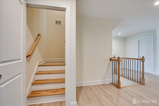 90 Hancock Rd, Piscataway, NJ 08854 - stairs featuring wood finished floors and recessed lighting