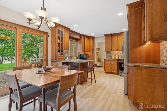 6 Steven Rd, South Brunswick, NJ 08824 - dining area featuring a chandelier, light wood finished floors, and recessed lighting