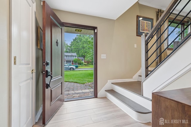 6 Steven Rd, South Brunswick, NJ 08824 - entrance foyer with stairway and light wood-style flooring