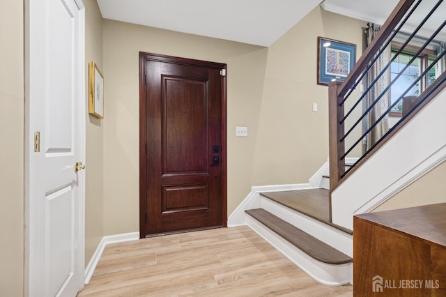 6 Steven Rd, South Brunswick, NJ 08824 - foyer entrance with light wood-style flooring and stairs