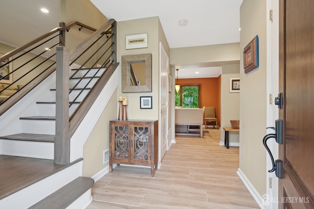6 Steven Rd, South Brunswick, NJ 08824 - foyer with stairs, light wood-style floors, and recessed lighting
