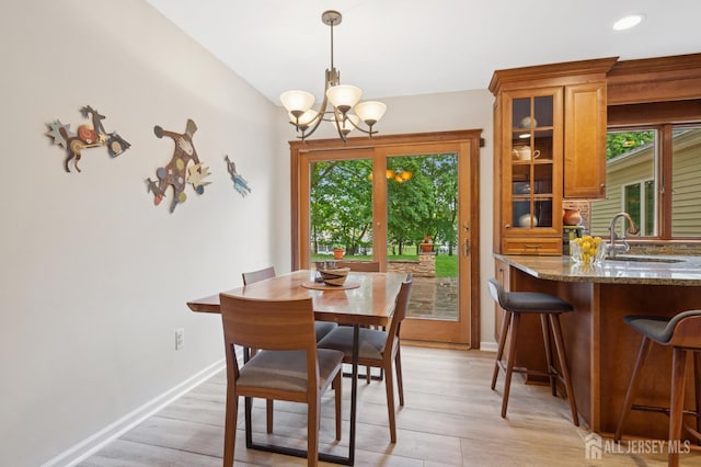 6 Steven Rd, South Brunswick, NJ 08824 - dining space with a chandelier and light wood-style floors