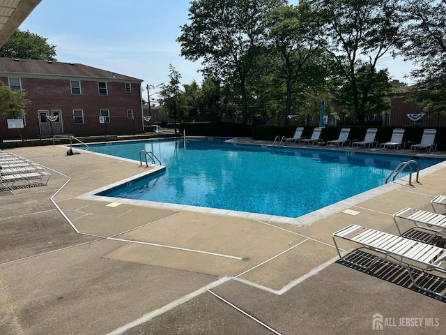 66 Fox Rd Unit 10A, Edison, NJ 08817 - community pool with a patio