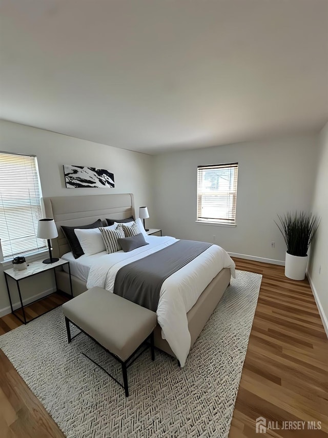 66 Fox Rd Unit 10A, Edison, NJ 08817 - bedroom featuring wood finished floors and baseboards
