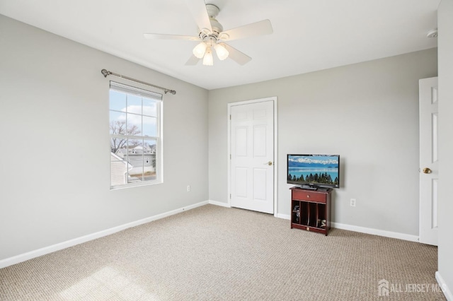 415 Lorillard Ave, Union Beach, NJ 07735 - interior space with carpet floors, baseboards, and ceiling fan