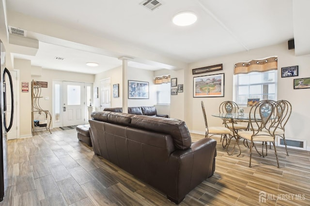 415 Lorillard Ave, Union Beach, NJ 07735 - living room featuring baseboards, visible vents, and wood finished floors