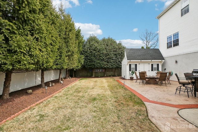415 Lorillard Ave, Union Beach, NJ 07735 - view of yard with an outdoor structure, a fenced backyard, and a patio area