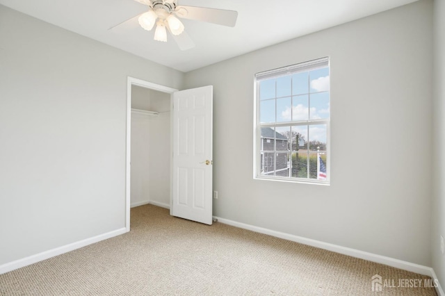 415 Lorillard Ave, Union Beach, NJ 07735 - unfurnished bedroom with light colored carpet, a ceiling fan, baseboards, and a closet
