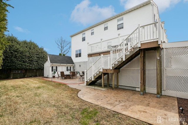 415 Lorillard Ave, Union Beach, NJ 07735 - rear view of property featuring stairs, an outdoor structure, a yard, and a patio area
