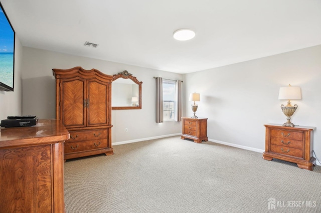 415 Lorillard Ave, Union Beach, NJ 07735 - living area featuring baseboards, visible vents, and light carpet