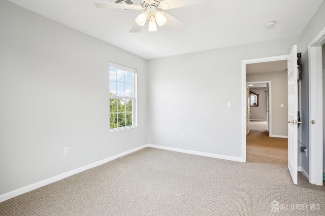 415 Lorillard Ave, Union Beach, NJ 07735 - unfurnished bedroom with baseboards, carpet flooring, and a ceiling fan