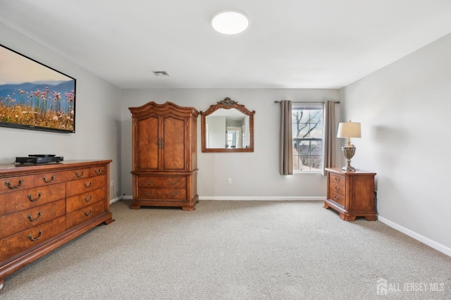 415 Lorillard Ave, Union Beach, NJ 07735 - bedroom with baseboards, light colored carpet, and visible vents