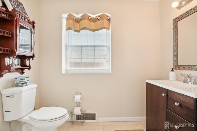415 Lorillard Ave, Union Beach, NJ 07735 - bathroom with tile patterned flooring, baseboards, toilet, and vanity