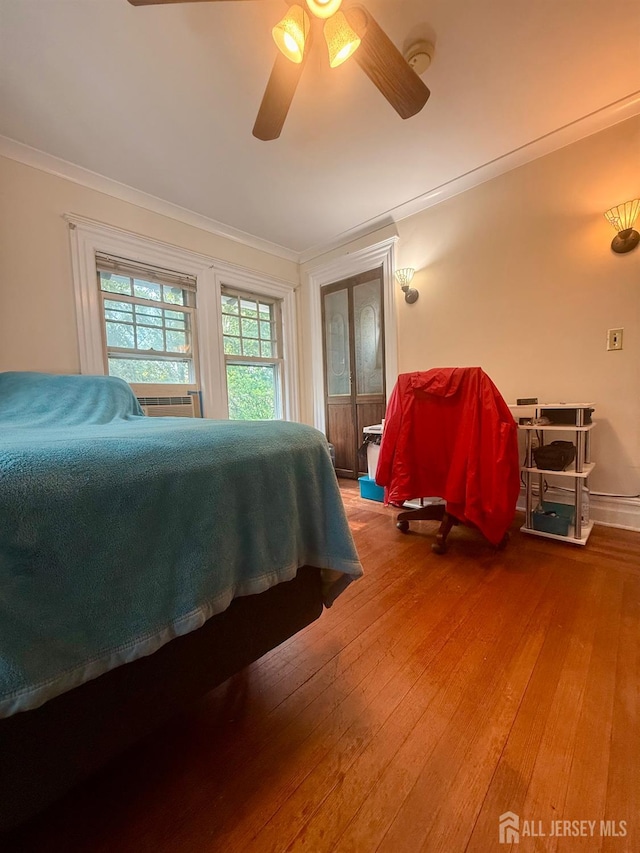 451 E Main St, Somerville, NJ 08876 - bedroom featuring hardwood / wood-style floors, crown molding, and a ceiling fan