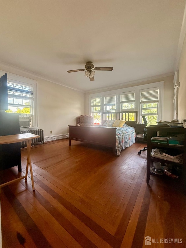 451 E Main St, Somerville, NJ 08876 - living area with wood-type flooring, an office area, healthy amount of natural light, and crown molding