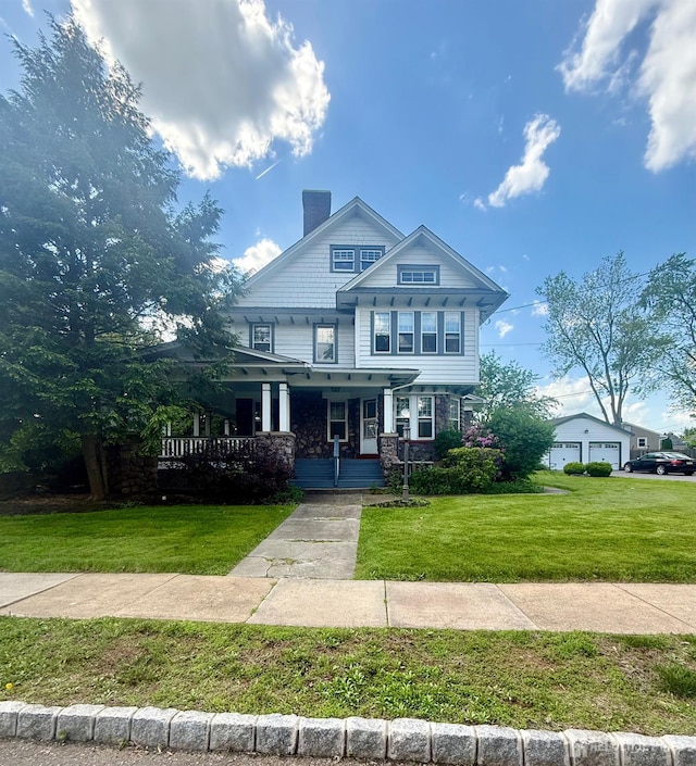 451 E Main St, Somerville, NJ 08876 - view of front facade with a chimney, covered porch, a front lawn, and stone siding