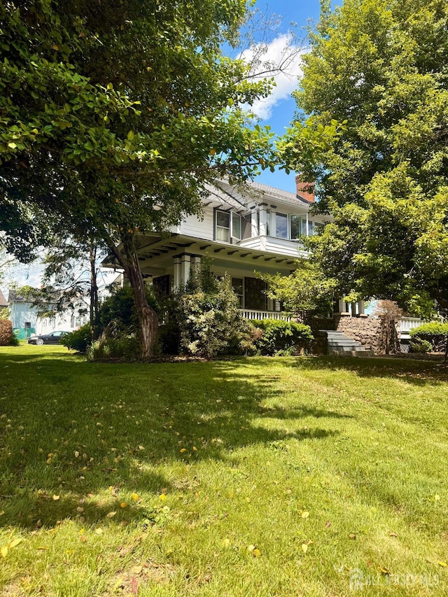 451 E Main St, Somerville, NJ 08876 - view of green lawn with covered porch