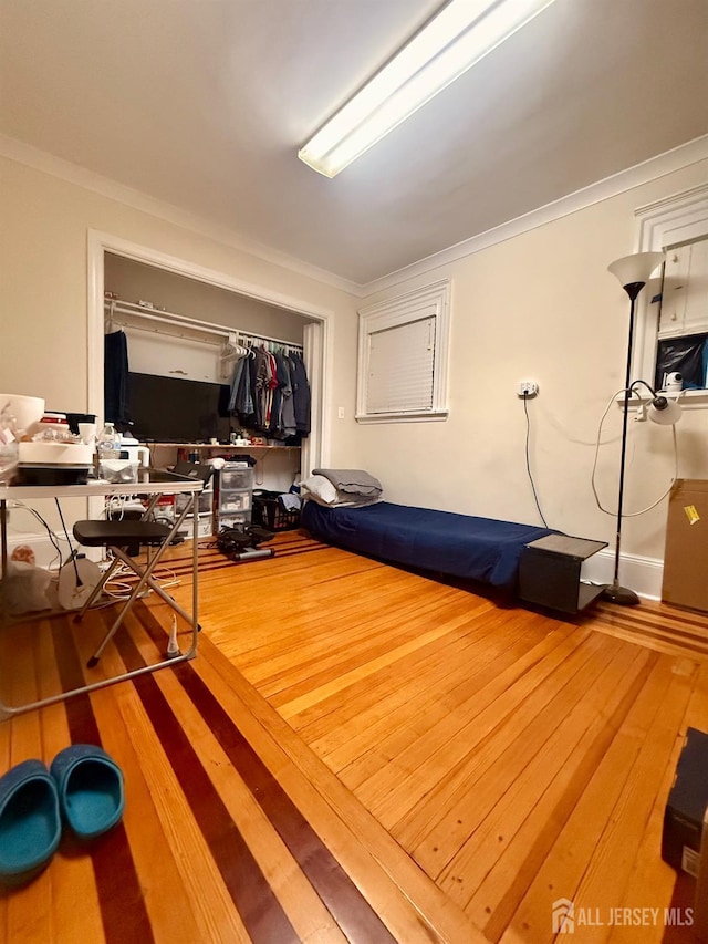 451 E Main St, Somerville, NJ 08876 - bedroom featuring ornamental molding and wood-type flooring