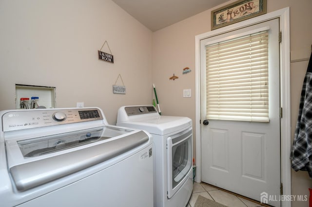 17 Duane St, Jamesburg, NJ 08831 - laundry area featuring washer and dryer and light tile patterned flooring