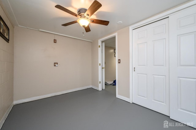 17 Duane St, Jamesburg, NJ 08831 - unfurnished bedroom with a closet, finished concrete flooring, and a ceiling fan