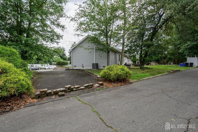 17 Duane St, Jamesburg, NJ 08831 - view of side of property with crawl space and a central air condition unit