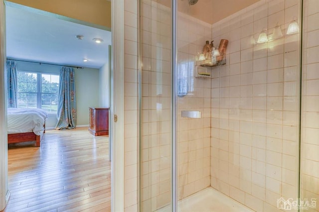 18 Bucknell Dr, East Brunswick, NJ 08816 - ensuite bathroom with baseboards, connected bathroom, wood finished floors, and a tile shower