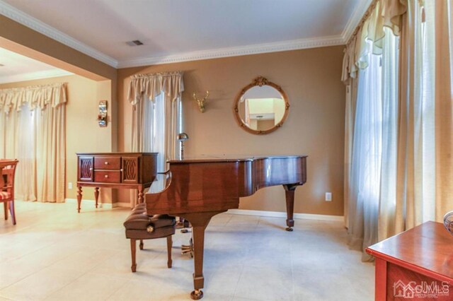 18 Bucknell Dr, East Brunswick, NJ 08816 - living area with crown molding, baseboards, and visible vents
