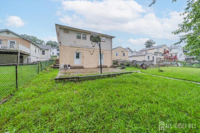 36 Henry St, Edison, NJ 08820 - back of house featuring a patio, a residential view, and a fenced backyard