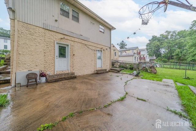 36 Henry St, Edison, NJ 08820 - rear view of house with a patio