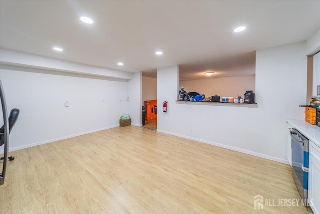 36 Henry St, Edison, NJ 08820 - unfurnished living room with light wood-style flooring and recessed lighting