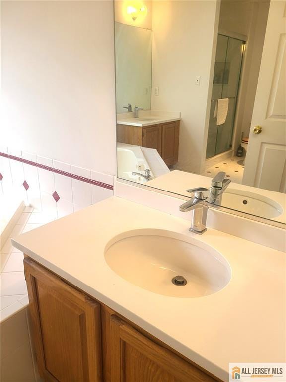 297 Prestwick Way Unit 297, Edison, NJ 08820 - bathroom featuring vanity, tile patterned floors, and a shower stall