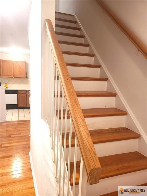 297 Prestwick Way Unit 297, Edison, NJ 08820 - staircase featuring hardwood / wood-style flooring