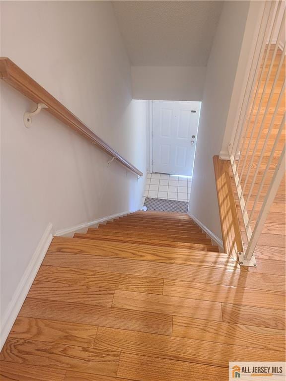 297 Prestwick Way Unit 297, Edison, NJ 08820 - stairway with wood finished floors and baseboards