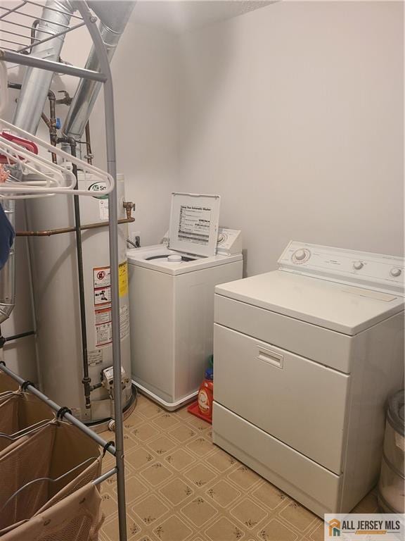 297 Prestwick Way Unit 297, Edison, NJ 08820 - laundry area featuring washer and dryer and light floors