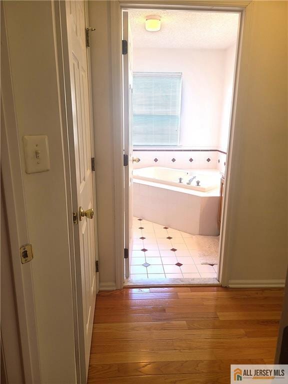 297 Prestwick Way Unit 297, Edison, NJ 08820 - corridor with wood finished floors