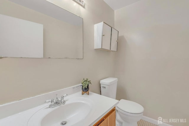 half bath with toilet and vanity