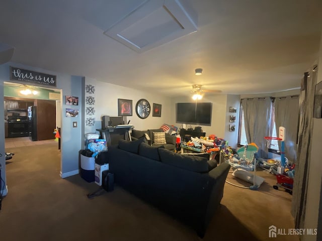 carpeted living room with ceiling fan