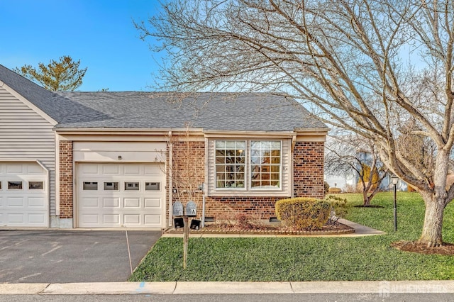 view of front facade featuring a garage, brick siding, crawl space, and aphalt driveway