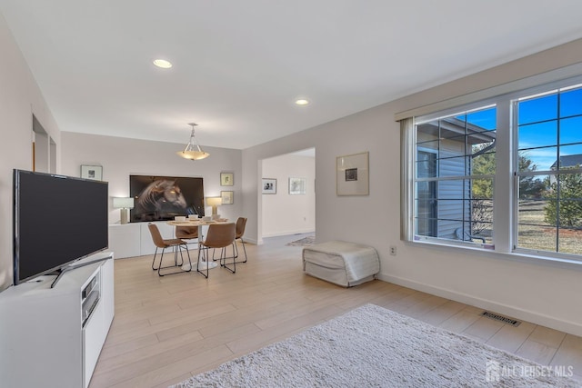 8 John Paul Jones Dr Unit 8A, Monroe, NJ 08831 - living area featuring light wood finished floors, baseboards, and recessed lighting