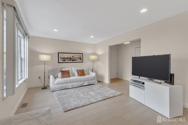 8 John Paul Jones Dr Unit 8A, Monroe, NJ 08831 - living room featuring light wood finished floors, plenty of natural light, baseboards, and recessed lighting