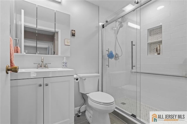 479 Newport Way, Monroe, NJ 08831 - bathroom with a stall shower, toilet, vanity, and tile patterned floors