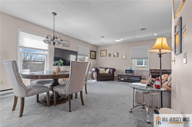 479 Newport Way, Monroe, NJ 08831 - carpeted dining room featuring a chandelier and a textured ceiling