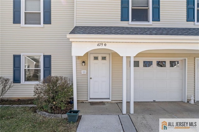 479 Newport Way, Monroe, NJ 08831 - doorway to property featuring a garage and a shingled roof