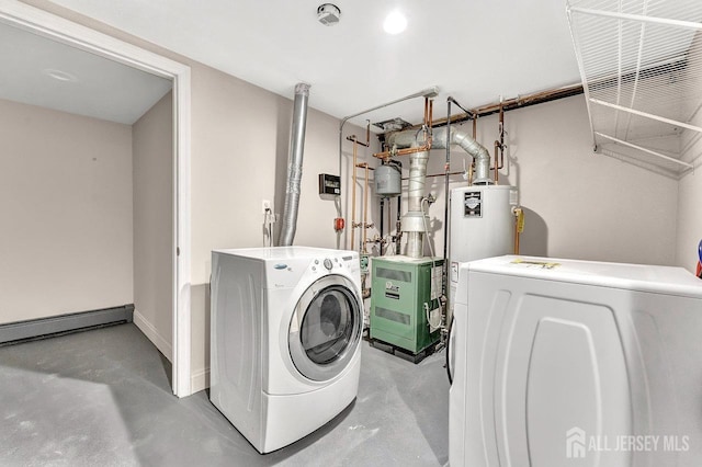 laundry area with baseboard heating, washing machine and dryer, and water heater