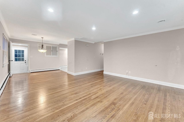 unfurnished living room featuring crown molding, baseboard heating, and light hardwood / wood-style floors