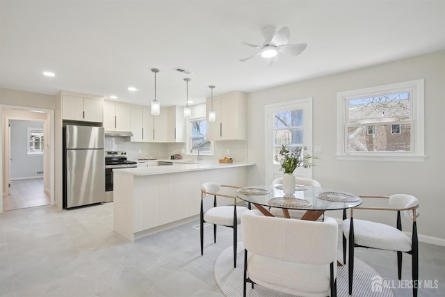 1779 Hughes Ter, Piscataway, NJ 08854 - dining area with baseboards, recessed lighting, and a ceiling fan